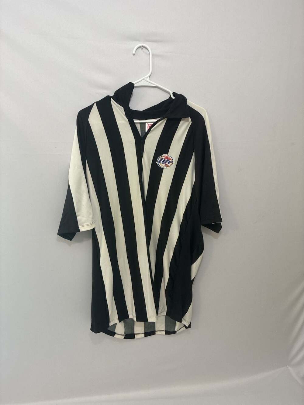 In Your Face Apparel Miller Lite Referee Black and White Striped Quarter Zip Shi